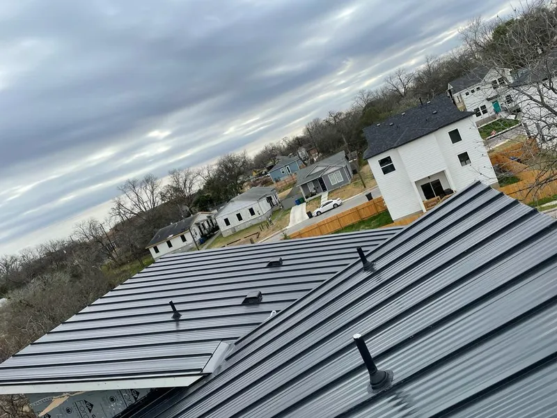 Standing seam metal roof panels with vents for Skylight Repair in Cinco Ranch